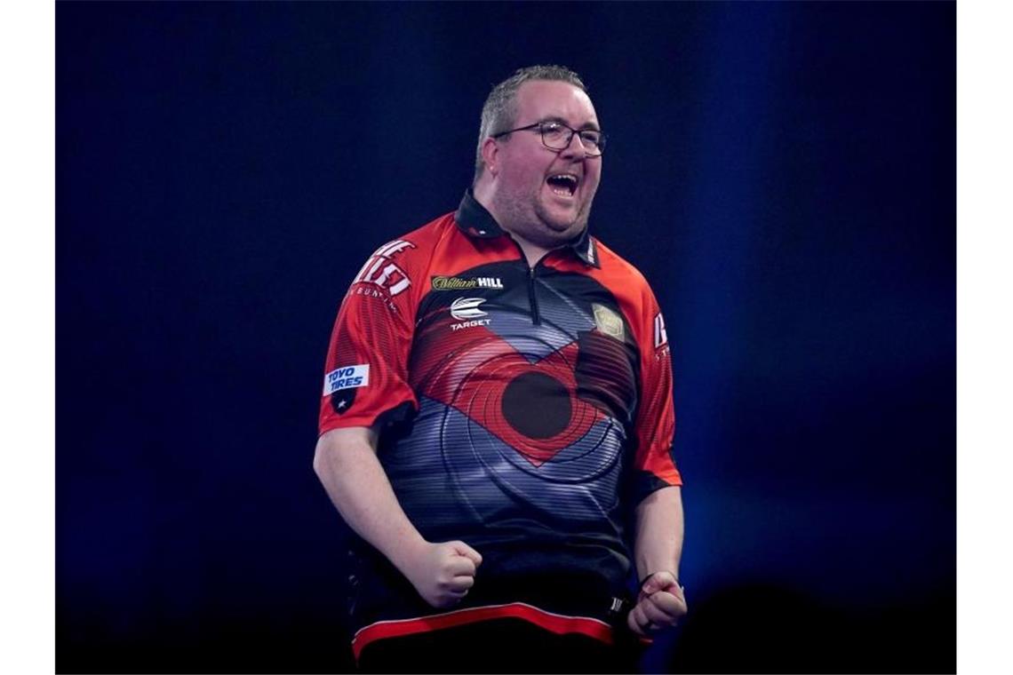 Stephen Bunting aus England jubelt über seinen Sieg im Viertelfinale gegen Krzysztof Ratajski aus Polen. Foto: John Walton/PA Wire/dpa