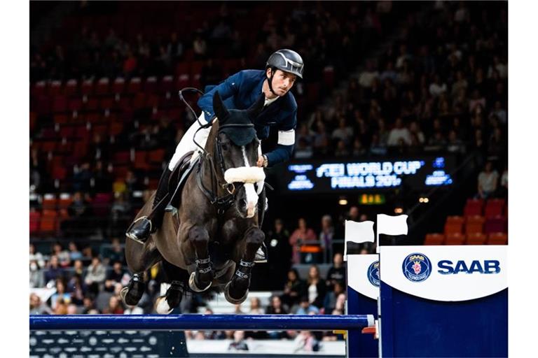 Steve Guerdat aus der Schweiz nimmt mit dem Pferd Alamo an einem Turnier teil. Foto: Mathias Bergeld/Bildbyran via ZUMA Press/Archivbild