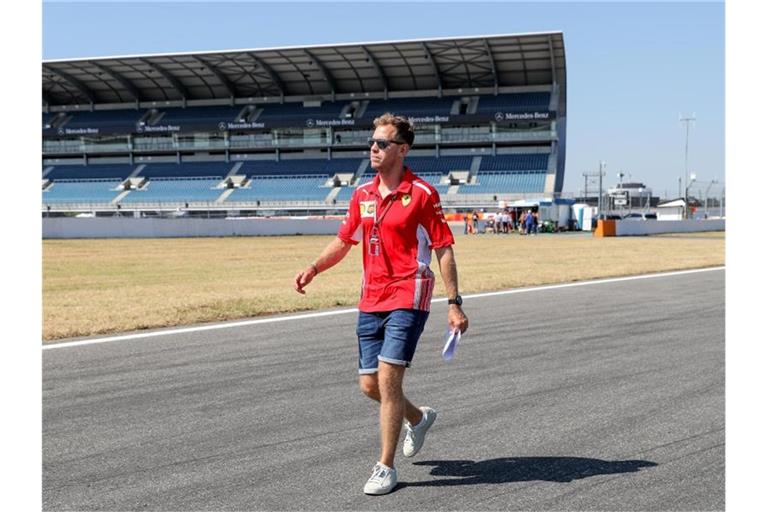 Sucht in diesem Jahr noch die Ideallinie: Ferrari-Pilot Sebastian Vettel. Foto: Jan Woitas