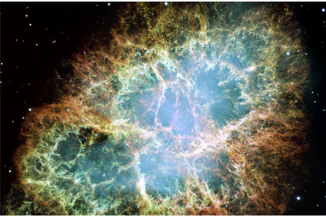 Woher kommt der Mensch? Eine Spurensuche im Kosmos Supernova-Explosionswolke im Sternbild Stier, aufgenommen vom Hubble-Weltraumteleskop im Dezember 2005. Der so genannte Krebsnebel war vor rund 1000 Jahren durch eine gewaltige Sternenexplosion entstanden.