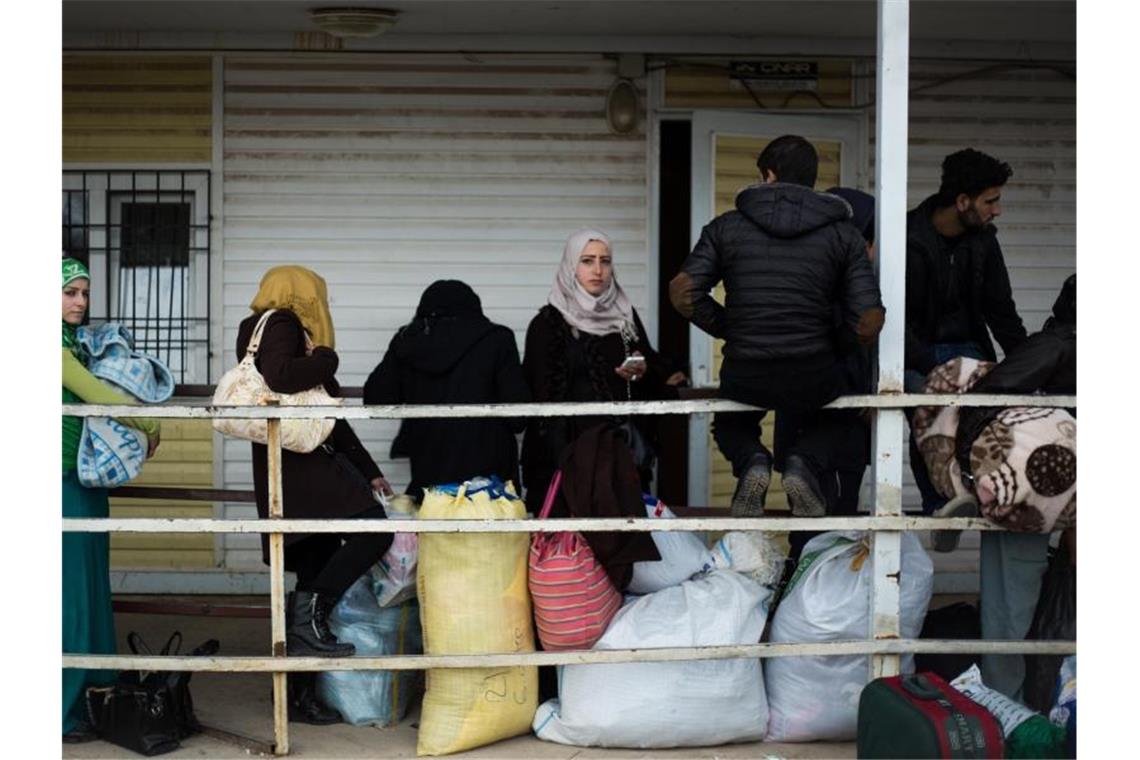 EU-Gutachten: Ungarn, Polen und Tschechien brachen EU-Recht Syrische Migranten warten darauf, im türkischen Flüchtlingslager Kilis aufgenommen zu werden. Foto: Uygar Onder Simsek/dpa