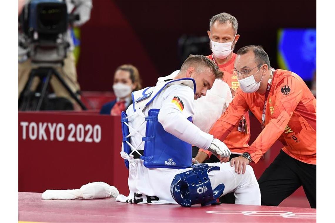 Das war die Olympia-Nacht Taekwondokämpfer Alexander Bachmann war nach seiner Niederlage enttäuscht. Foto: Swen Pförtner/dpa