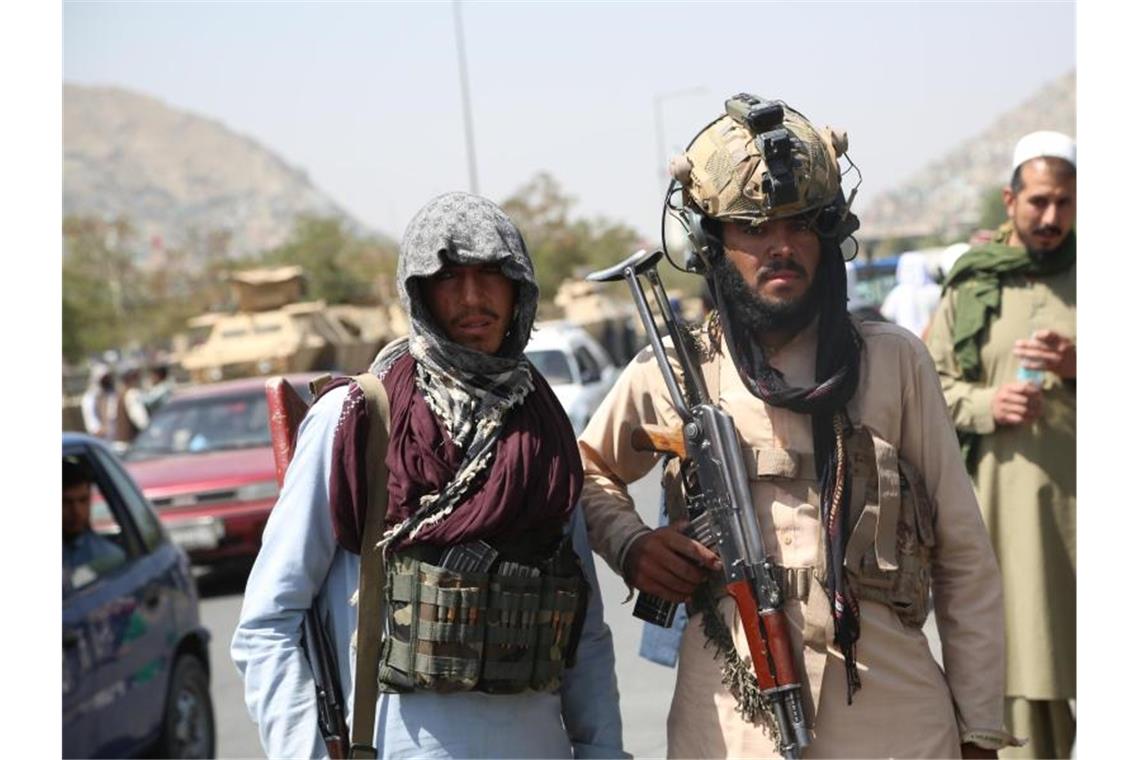 Wer trägt Schuld am Desaster in Afghanistan? Taliban-Kämpfer in Kabul. Foto: -/XinHua/dpa