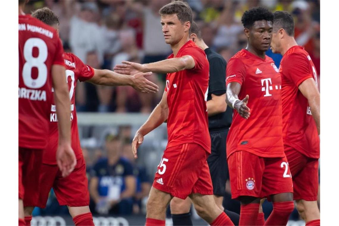 Thomas Müller (M) erzielte gleich drei Treffer für die Bayern. Foto: Sven Hoppe