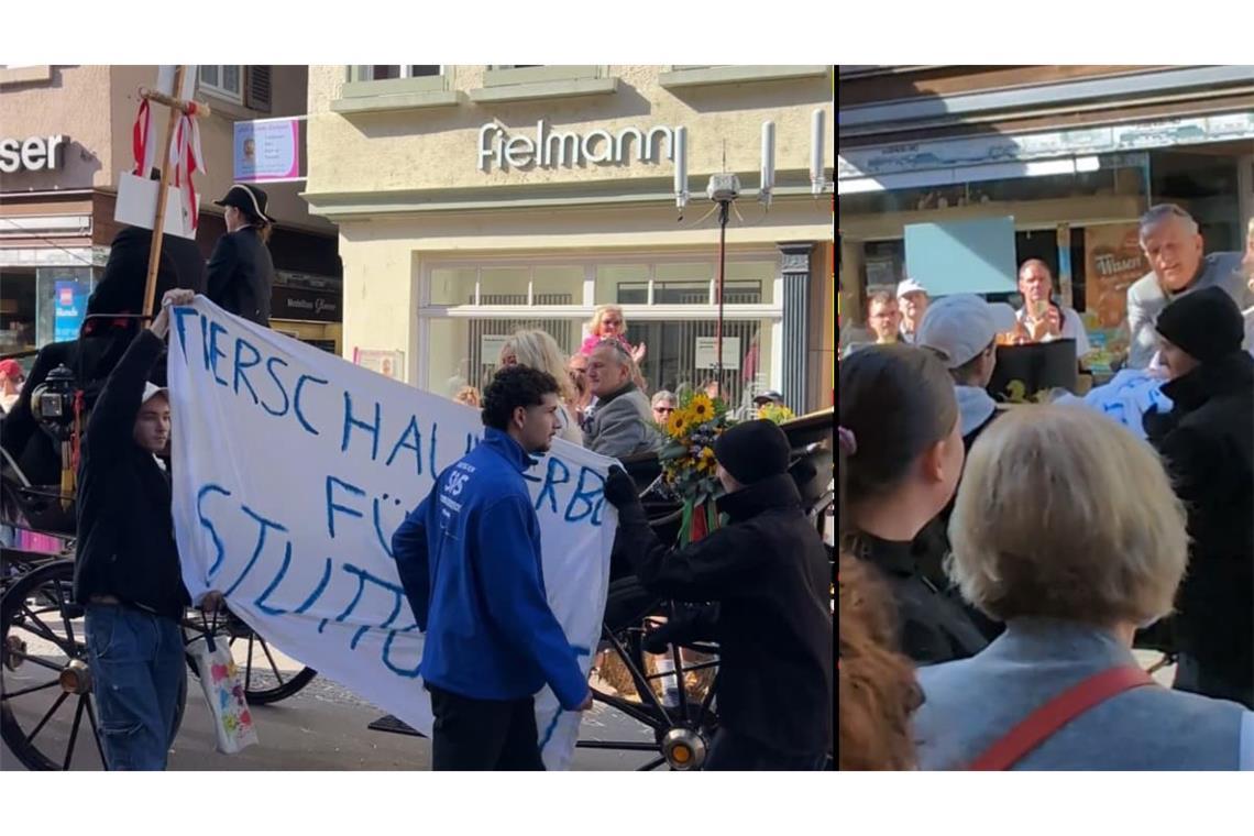 Tierschutz-Aktivisten halten beim Cannstatter Volksfestumzug ein Banner hoch. Kurz darauf greift Oberbürgermeister Frank Nopper vom Wagen aus ein.