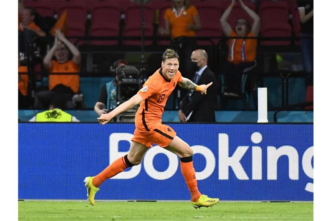 Torschütze Wout Weghorst von den Niederlanden feiert das 2:0 gegen die Ukraine. Foto: Piroschka Van De Wouw/Pool Reuters/AP/dpa