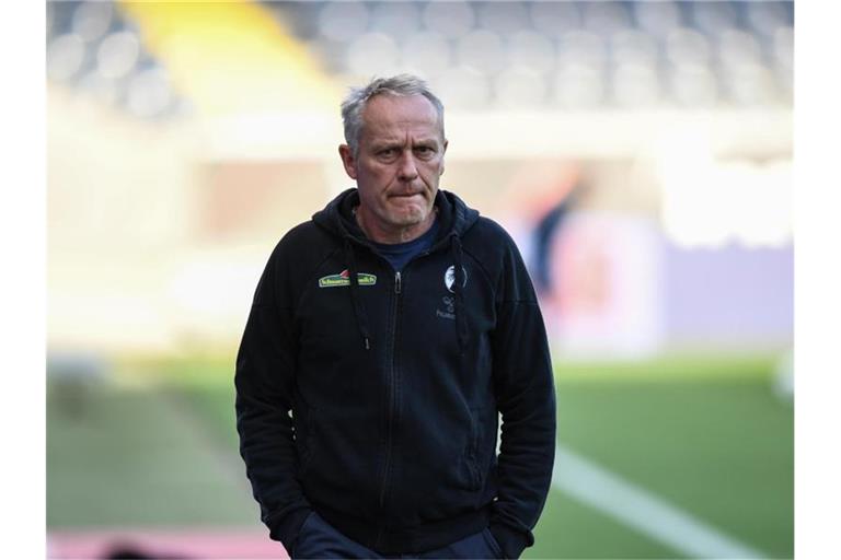 Trainer Christian Streich aus Freiburg kommt zum Interview. Foto: Arne Dedert/dpa-Pool/dpa/Archivbild