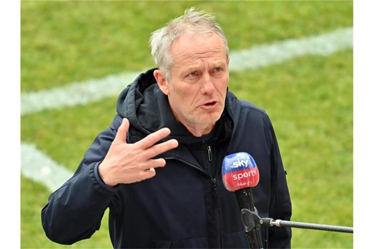Trainer Christian Streich spricht. Foto: Torsten Silz/dpa/Archivbild