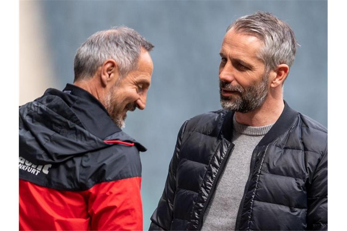 Die neue Macht der Toptrainer: Wieso ihre Bedeutung steigt Trainer, die dank Ausstiegsklauseln den Verein wechseln können: Adi Hütter (l) und Marco Rose. Foto: Marius Becker/dpa