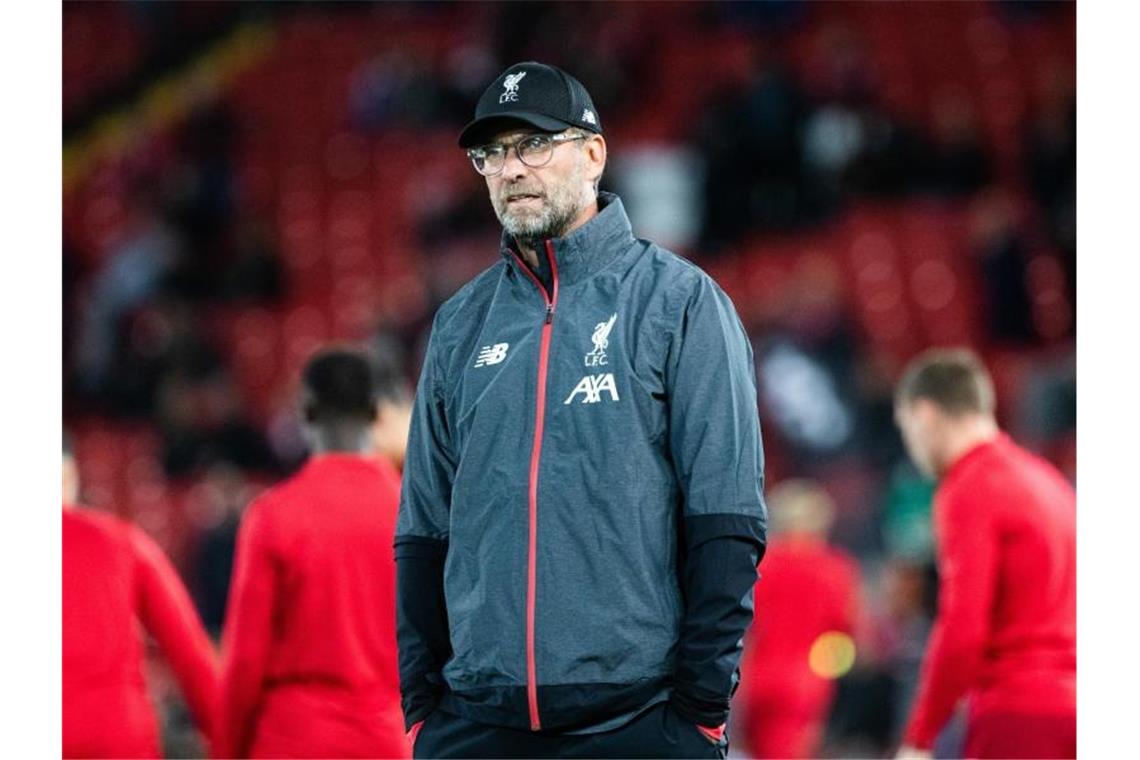 Trainer Jürgen Klopp (r) erlebte mit dem FC Liverpool ein schwieriges Spiel. Foto: Georg Hochmuth/APA/dpa