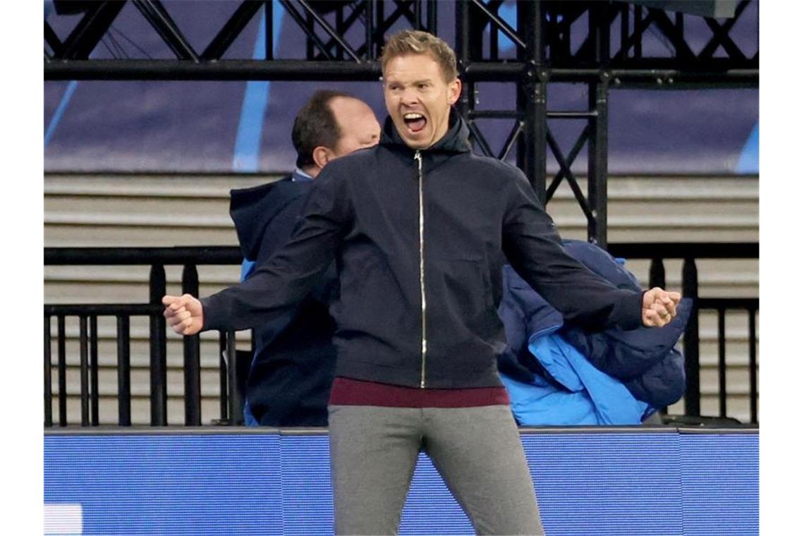 Trainer Julian Nagelsmann von Leipzig jubelt über den Sieg. Foto: Jan Woitas/dpa-Zentralbild/dpa