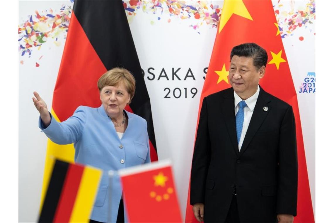 Treffen beim G20-Gipfel in Osaka im Juni: Bundeskanzlerin Angela Merkel und der chinesische Präsident Xi Jinping. Foto: Bernd von Jutrczenka