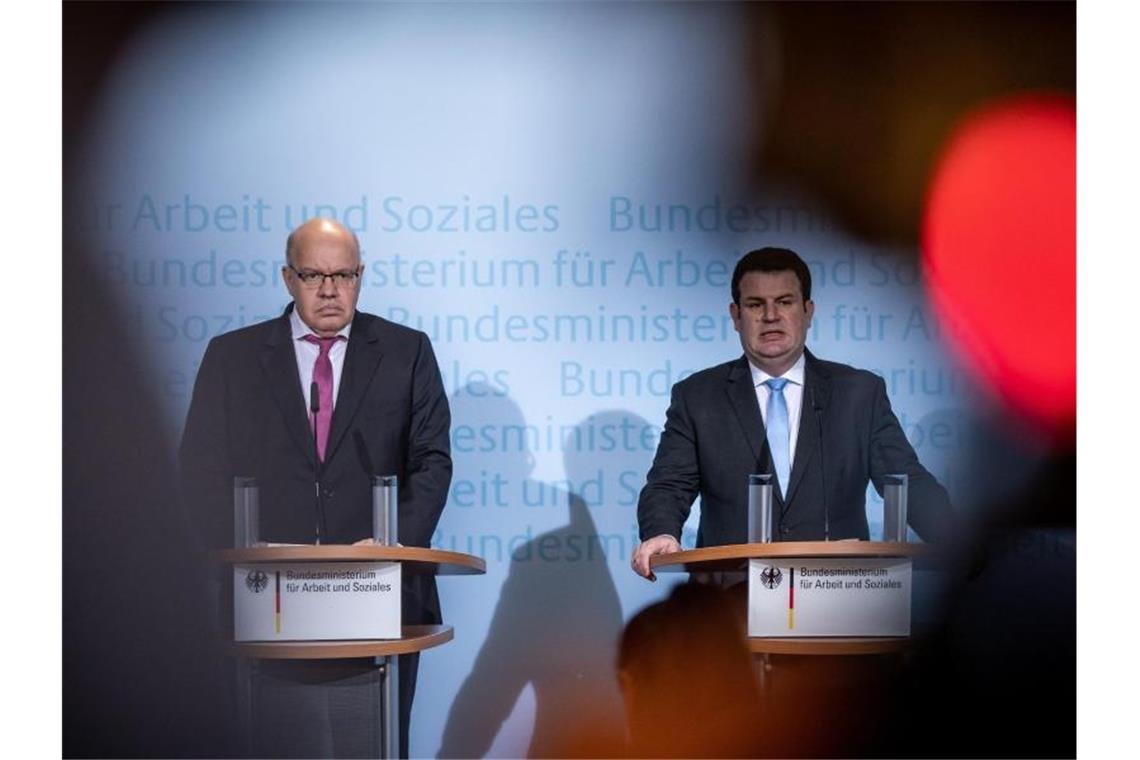 Treffen sich zu Gesprächen: Peter Altmaier und Hubertus Heil. Foto: Michael Kappeler/dpa