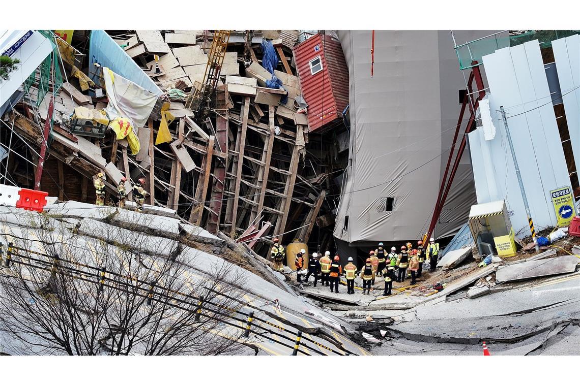 Bilder des Tages Trümmerlandschaft: Südkoreanische Feuerwehrleute arbeiten an der Stelle einer eingestürzten U-Bahn-Baustelle in Gwangmyeong in Südkorea.