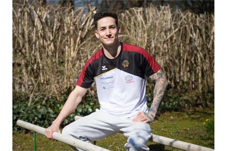 Turner Marcel Nguyen ist gegen eine bevorzugte Corona-Impfung bei Sportlern. Foto: Matthias Balk/dpa