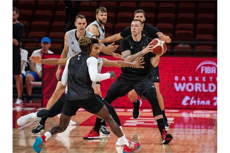 Üben für den WM-Auftakt: Das DBB-Team beim Training in China. Foto: Swen Pförtner