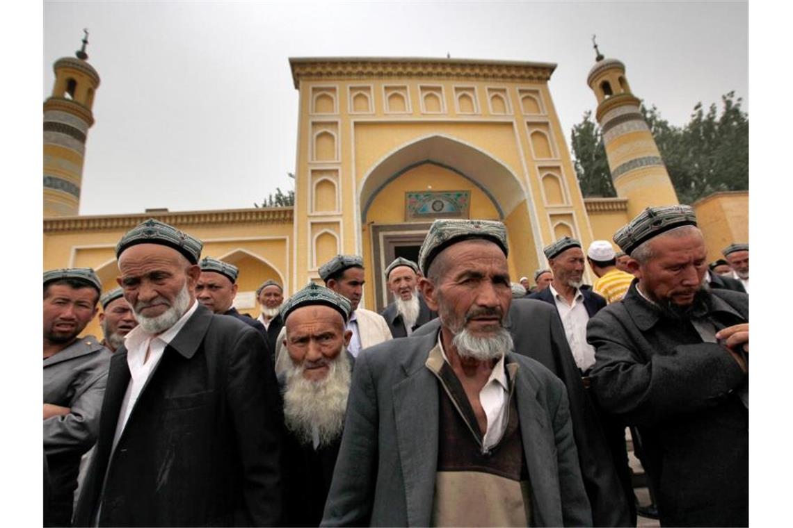 Uiguren in Kashgar im Nordwesten Chinas. Foto: How Hwee Young/EPA/dpa