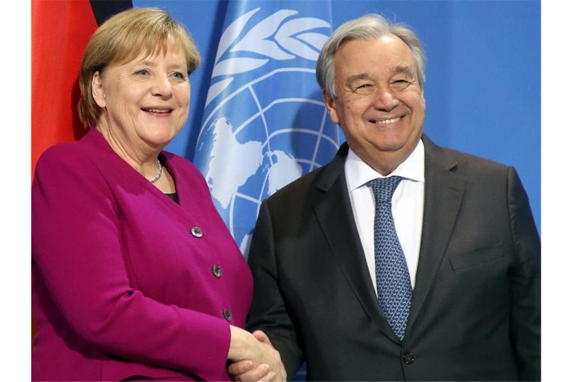 UN-Chef António Guterres wollte Ex-Bundeskanzlerin Angela Merkel als Beraterin gewinnen. Foto: Wolfgang Kumm/dpa