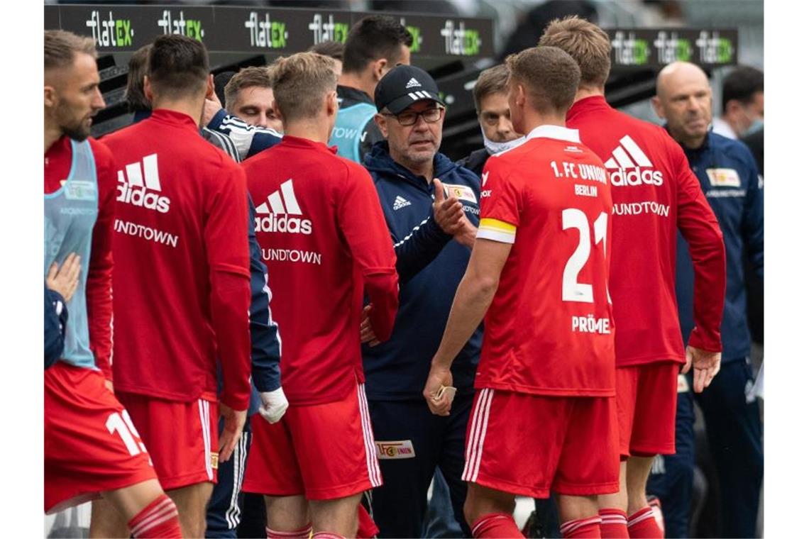 Union Berlin freut sich über einen glücklichen Punktgewinn in Mönchengladbach. Foto: Bernd Thissen/dpa