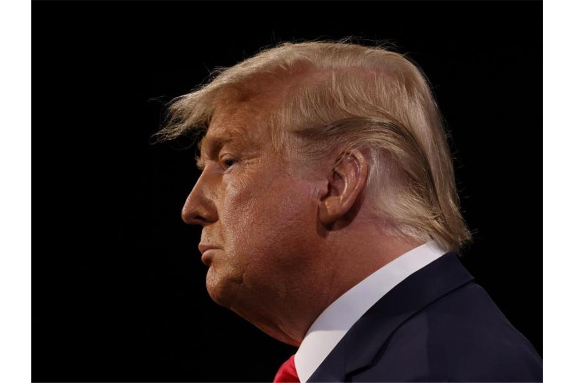 TV-Debatte mit Biden - Trump versucht Aufholjagd US-Präsident Donald Trump fordert ein Ende der Corona-Auflagen. Foto: Jim Bourg/Pool Reuters/AP/dpa