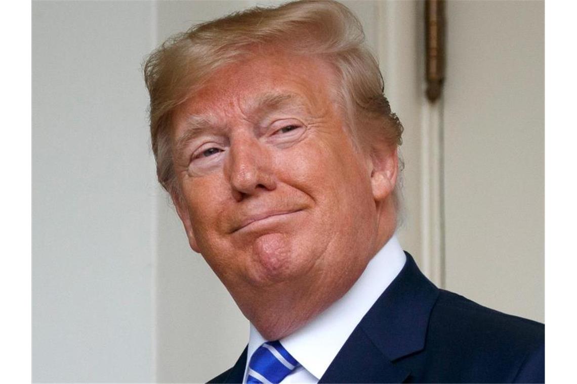 Handelskrieg verschärft Sorge vor globaler Rezession US-Präsident Donald Trump hat neue Strafzölle gegen China angekündigt. Foto: Evan Vucci/AP