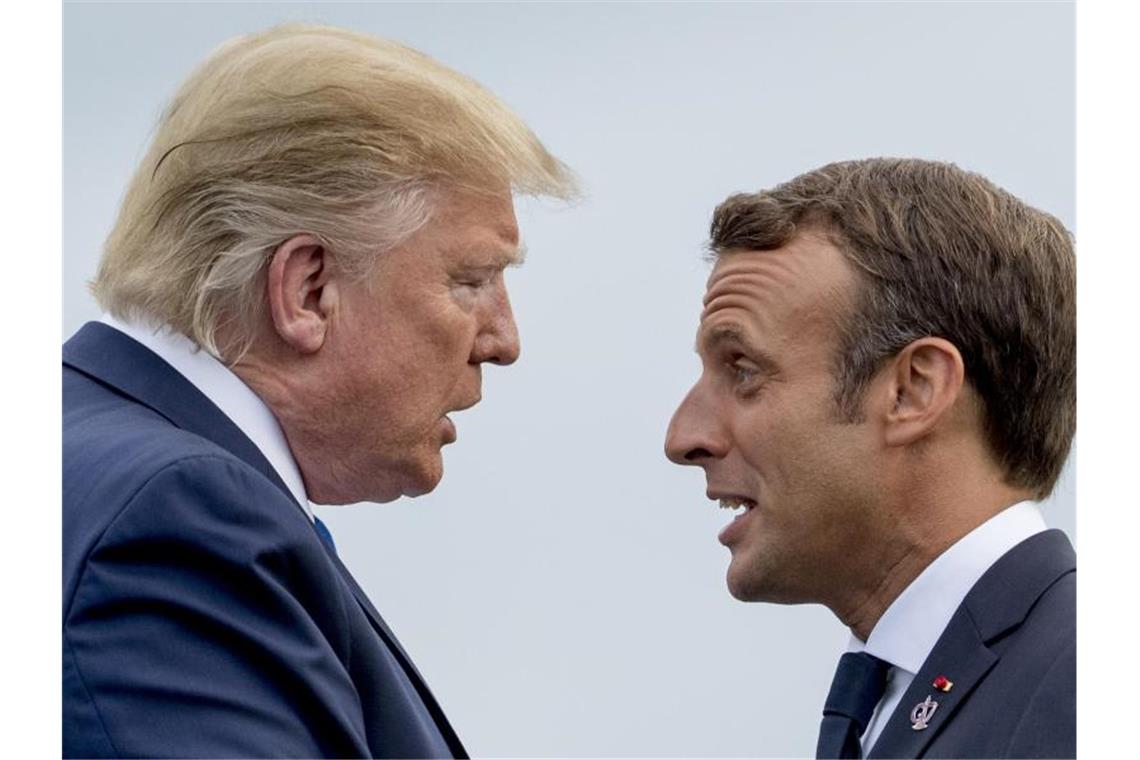 US-Präsident Donald Trump (l) und Frankreichs Staatspräsident Emmanuel Macron beim G7-Gipfel in Biarritz. Foto: Andrew Harnik/AP