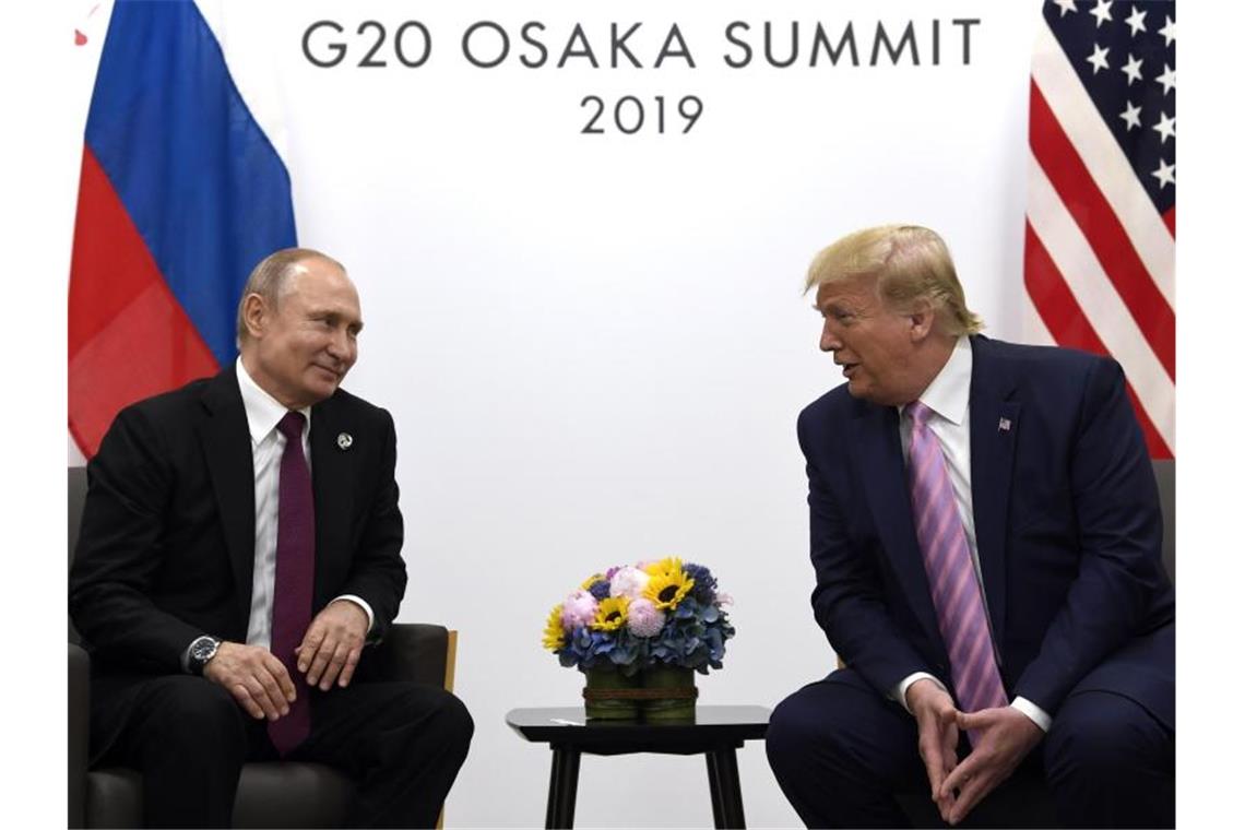 US-Präsident Donald Trump (r) und Russlands Präsident Wladimir Putin. Foto: Archiv/Susan Walsh/AP/dpa