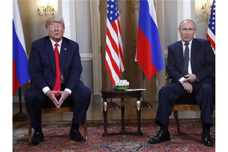 US-Präsident Donald Trump und der russische Präsident Wladimir Putin bei einem Treffen in Helsinki im Sommer 2018. Foto: Pablo Martinez Monsivais/AP