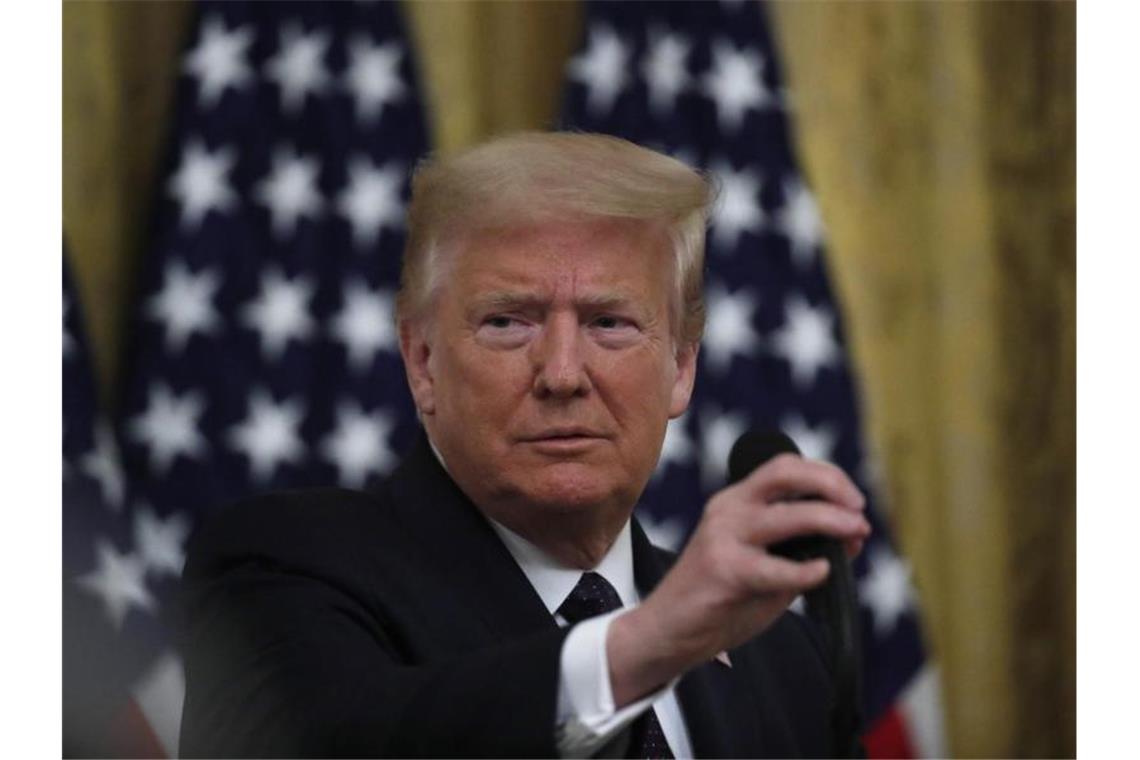 China droht USA wegen Sanktionsgesetz mit Widerstand US-Präsident Donald Trump will China sanktionieren. Foto: Alex Brandon/AP/dpa