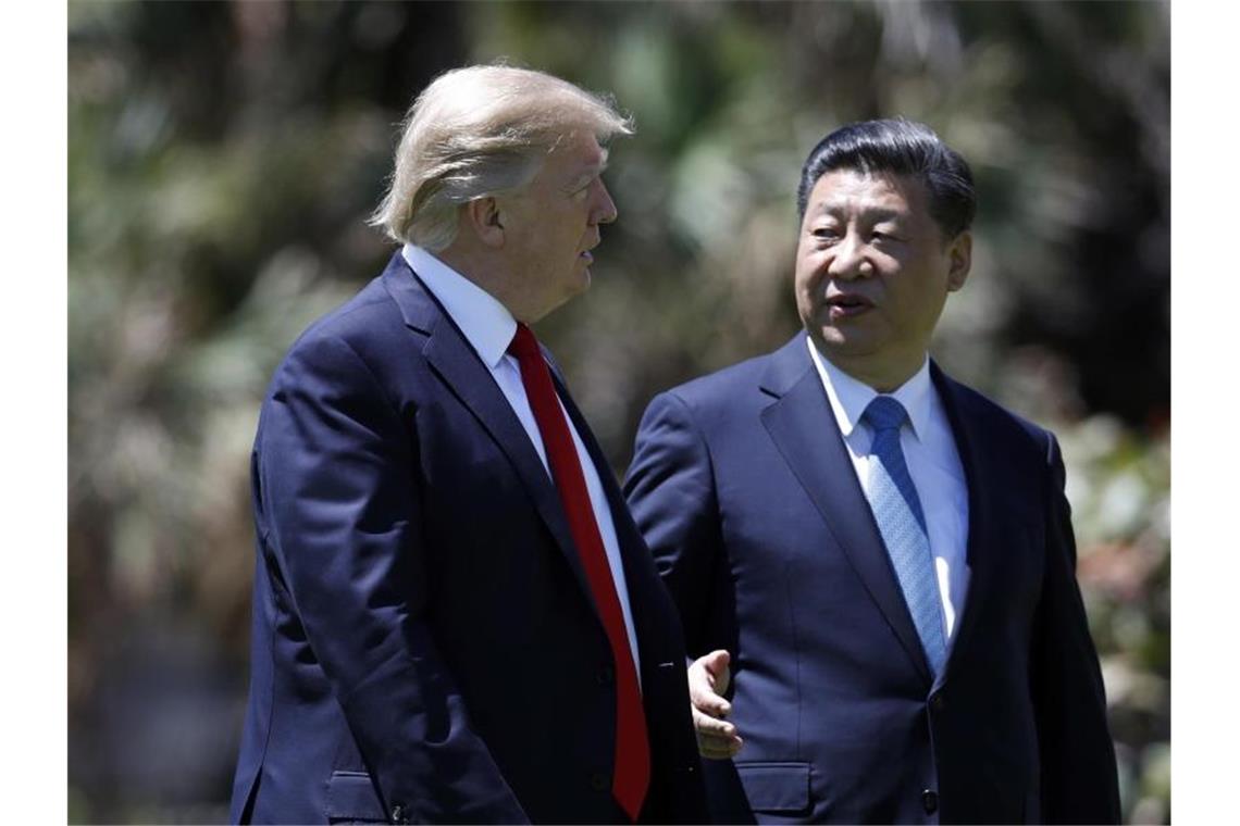 US-Präsident Trump und Chinas Staatschef Xi Jinping Anfang April 2017 nach einem Treffen in Florida. Foto: Alex Brandon/AP