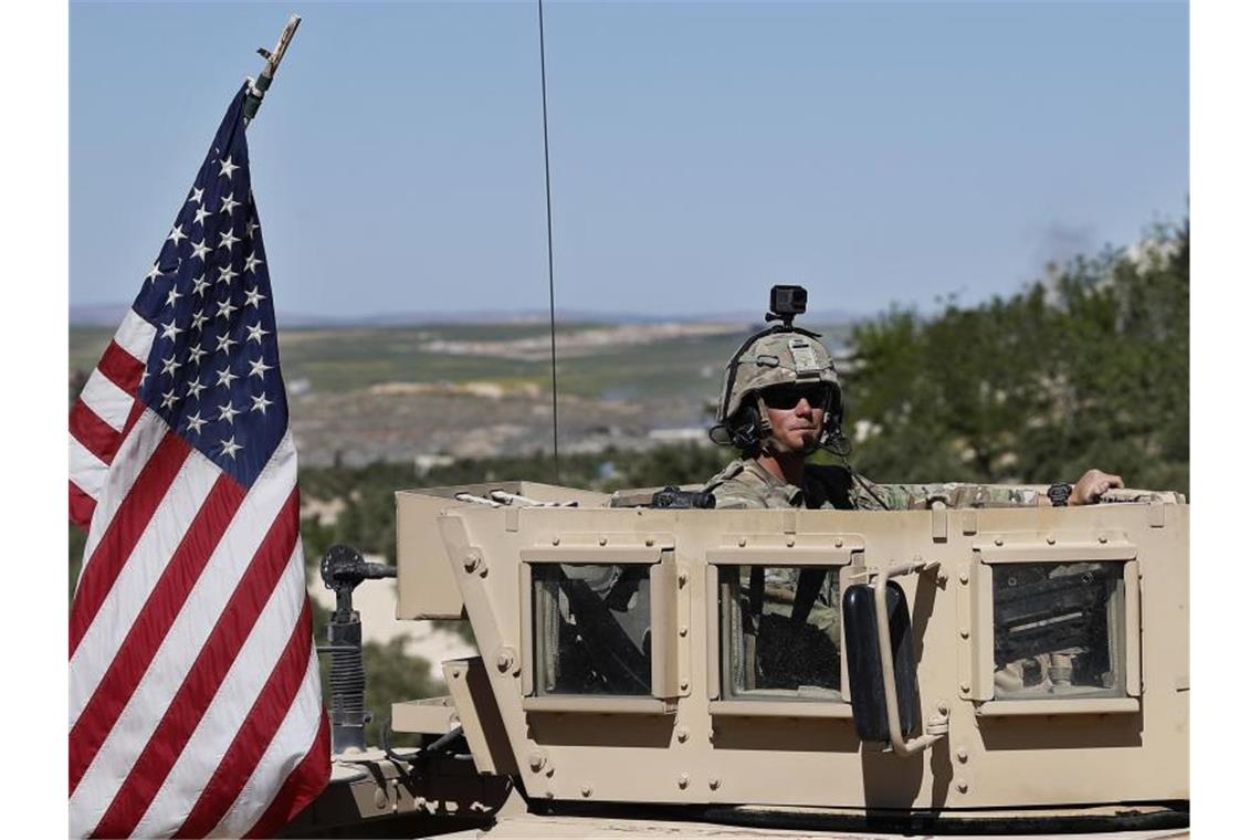 Säbelrasseln zwischen USA und Iran geht weiter US-Truppen im syrischen Manbidsch. Foto: Hussein Malla/AP