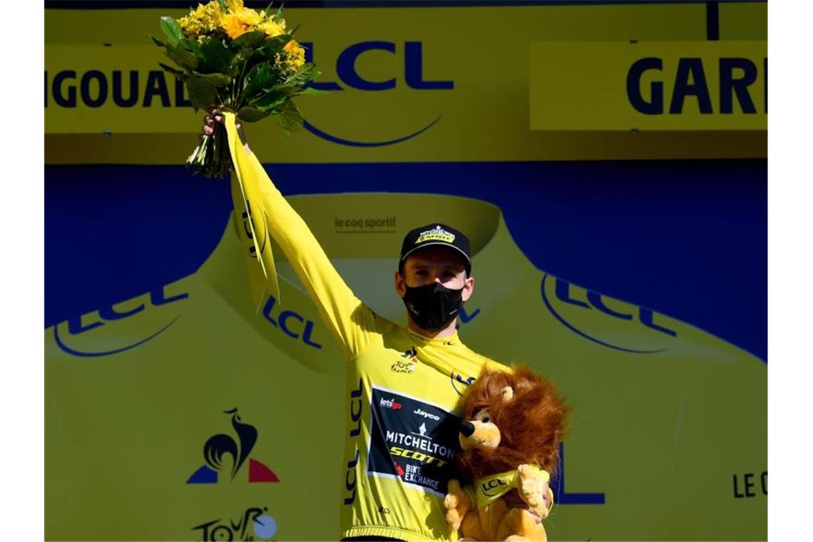 Verteidigte sein Gelbes Trikot erfolgreich: Adam Yates. Foto: Stuart Franklin/AFP/dpa