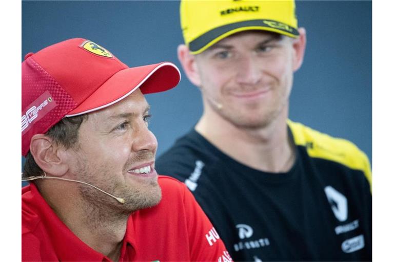 Vertreten die deutschen Farben in der Formel 1: Sebastian Vettel (l) und Nico Hülkenberg. Foto: Sebastian Gollnow