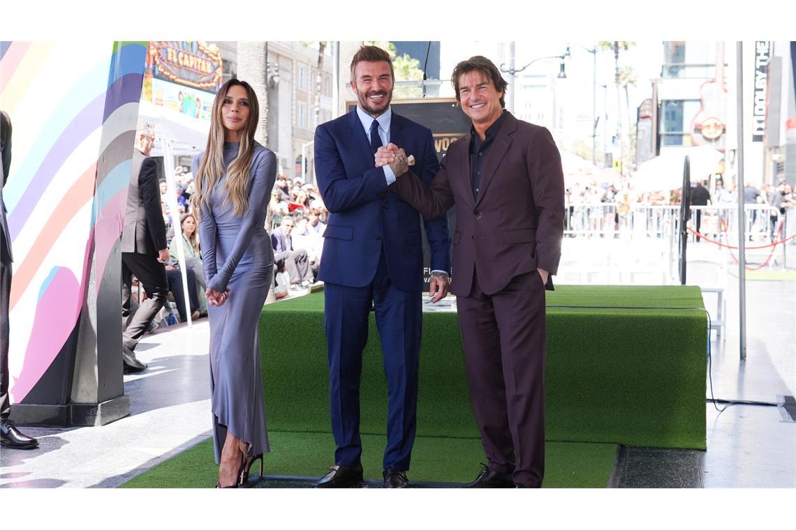 Victoria Beckham, David Beckham und Tom Cruise posierten auf dem Hollywood Walk of Fame vor David Beckhams neuem Stern.