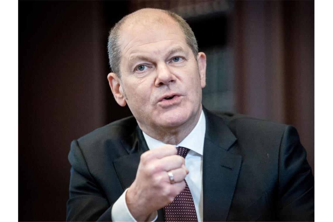 Lockdown wohl bis Februar Vizekanzler Olaf Scholz rechnet mit einer Verschärfung der Corona-Maßnahmen am Dienstag. Foto: Kay Nietfeld/dpa