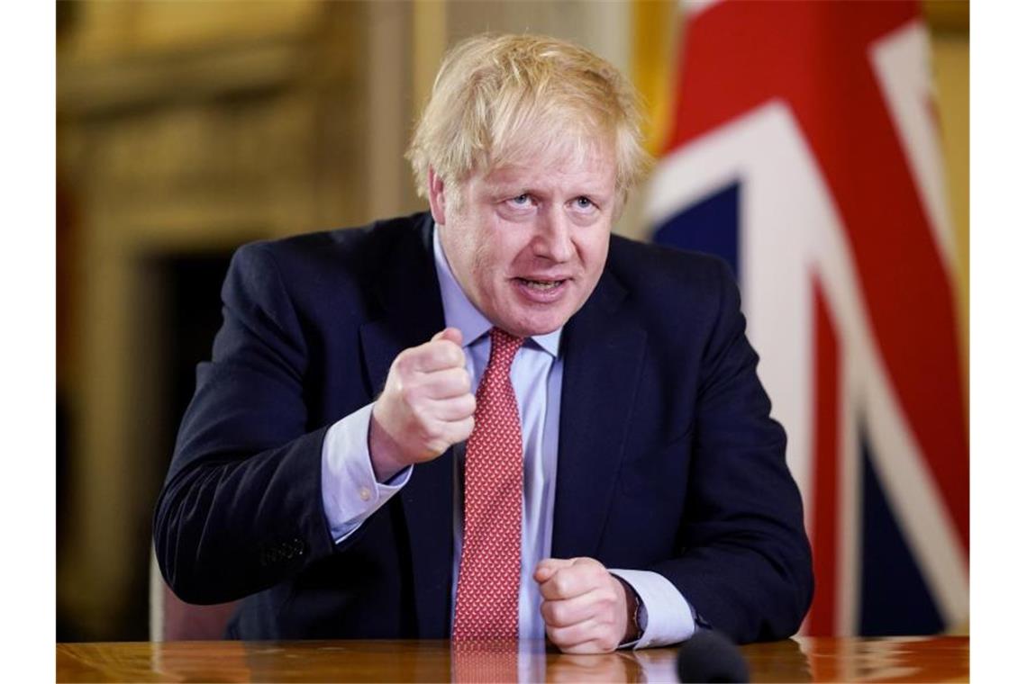 „Von heute Abend an muss ich dem britischen Volk eine einfache Anordnung geben: Sie müssen zuhause bleiben“, sagt Johnson in seiner Fernsehansprache. Foto: Andrew Parsons/No 10 Downing Street/Handout via Xinhua/dpa