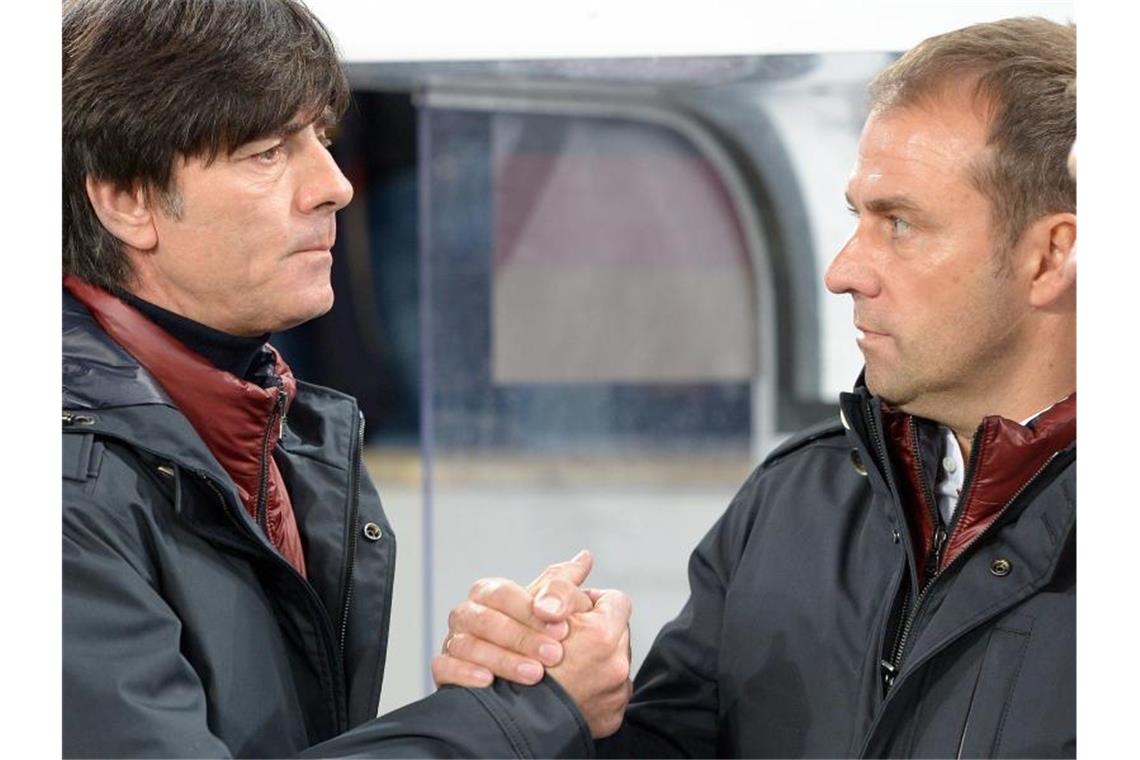 Rangnick, Flick, Klopp: Wer könnte Joachim Löw ersetzen? War Löws Assistent und wäre dem DFB als Nachfolger des Bundestrainers am liebsten: Hansi Flick (r). Foto: picture alliance / dpa