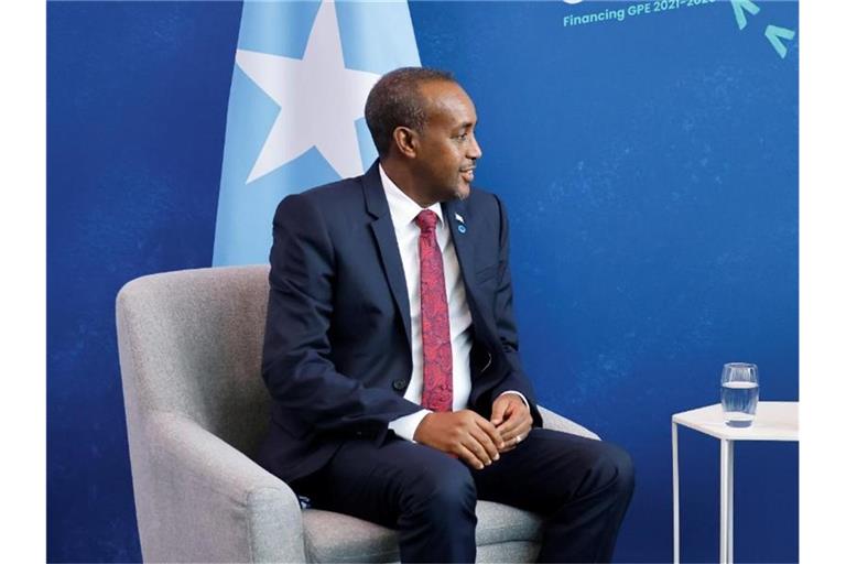Weist die Vorwürfe des Präsidenten zurück: Der entlassene Premier Mohamed Hussein Roble. Foto: Tolga Akmen/PA/dpa/Archiv