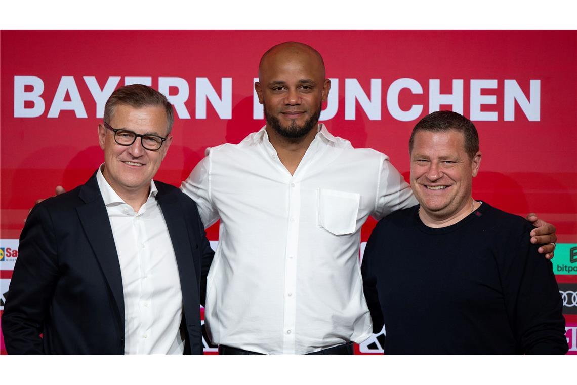 "Der Boss bleibt": Neuer Kompany-Vertrag vor Belgien-Duell Weiter ein Team: Vorstandschef Jan-Christian Dreesen (l), Trainer Vincent Kompany (M) und Sportvorstand Max Eberl. (Archivbild)