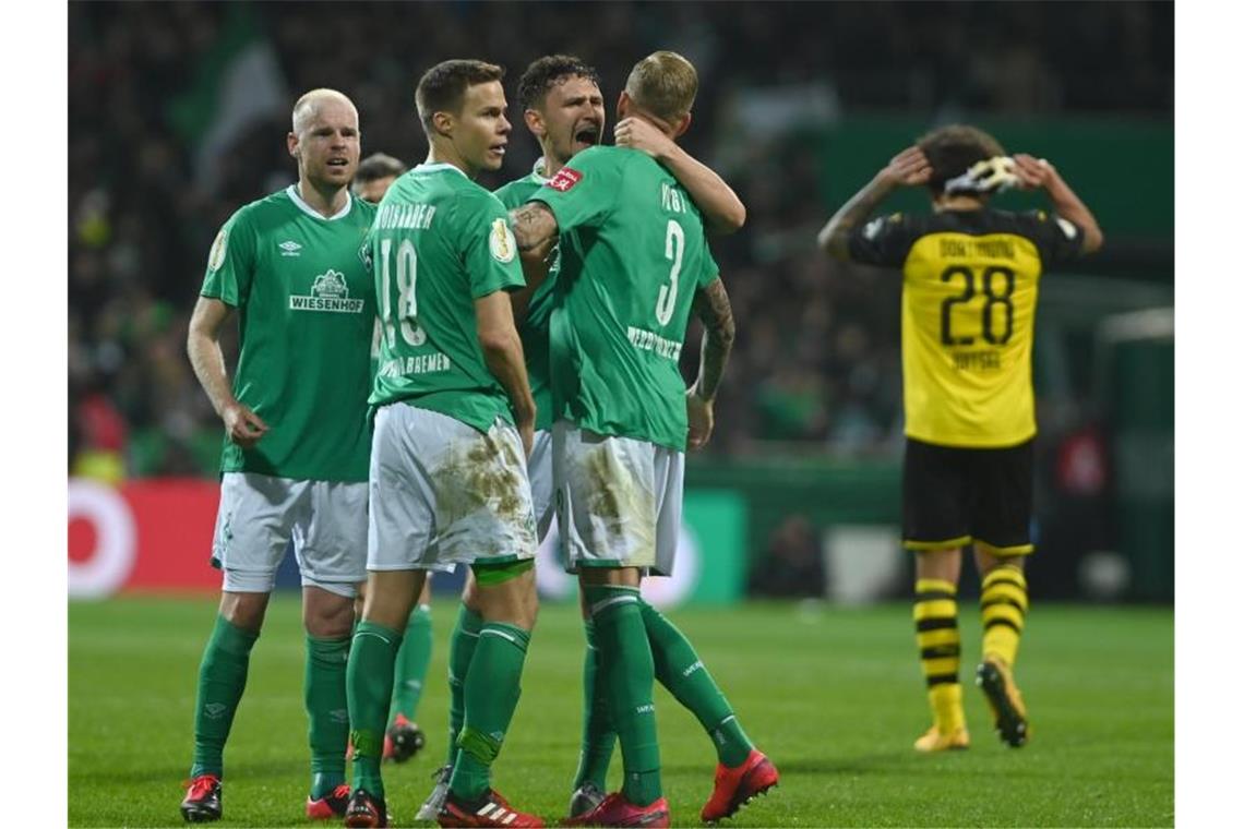 Frankfurt, Düsseldorf, Bremen und Schalke im Viertelfinale Werder Bremen feierte mit einem Sieg gegen Dortmund den Halbfinaleinzug. Foto: David Hecker/dpa