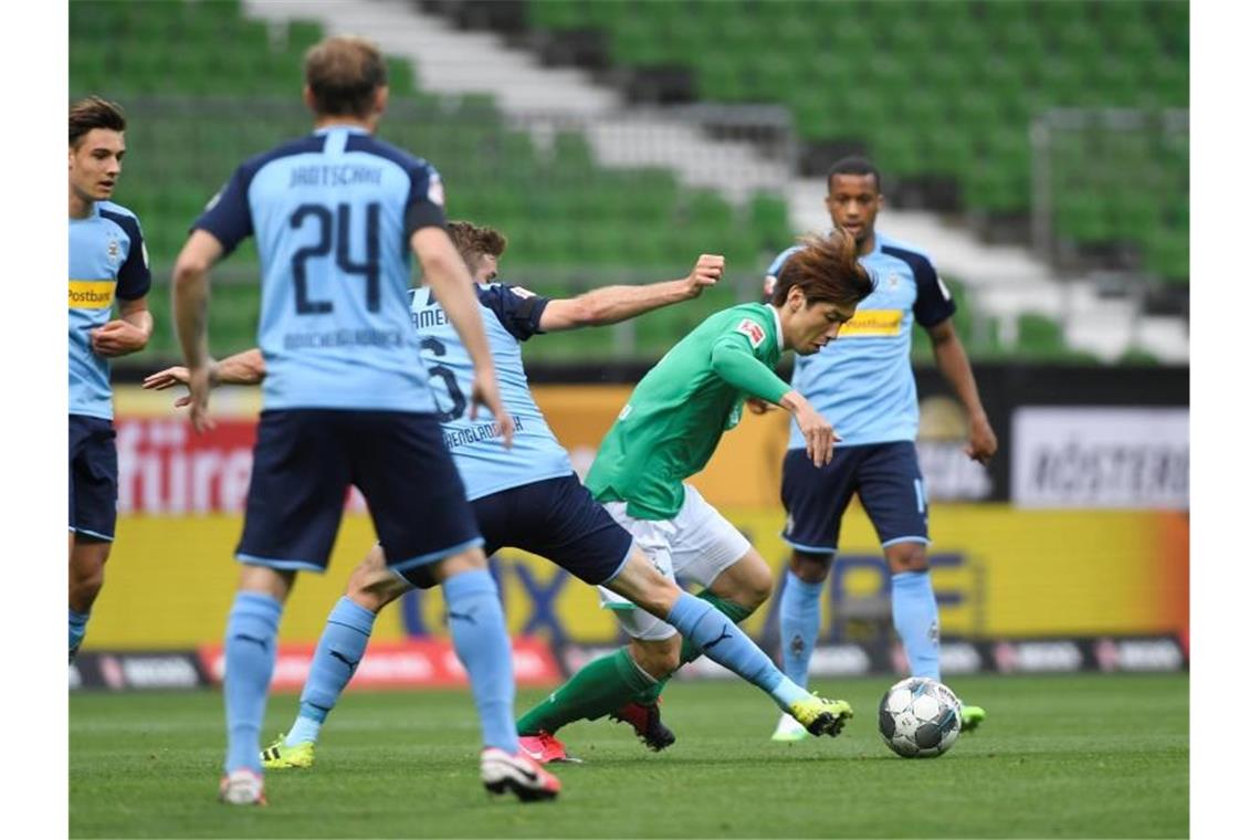 Werder Bremens und Borussia Mönchengladbach teilten sich die Punkte. Foto: Fabian Bimmer/reuters - Pool/dpa