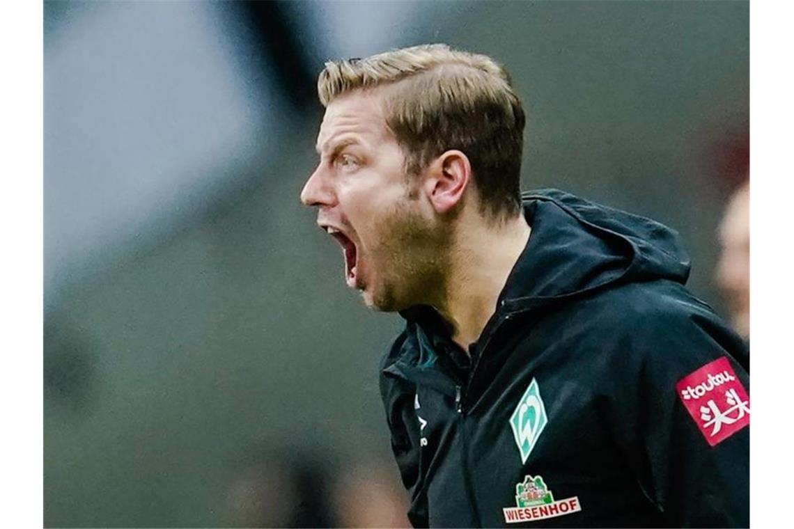 Frankfurt im Halbfinale - Werder über Elfer verärgert Werder-Trainer Florian Kohfeldt ist außer sich. Foto: Uwe Anspach/dpa