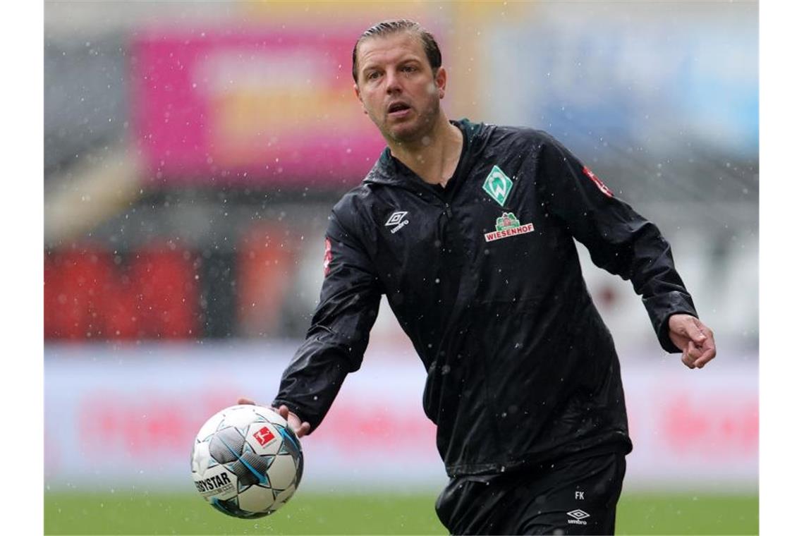 Werder-Trainer Florian Kohfeldt kämpft mit seinem Team um den Klassenerhalt. Foto: Friedemann Vogel/EPA/Pool/dpa