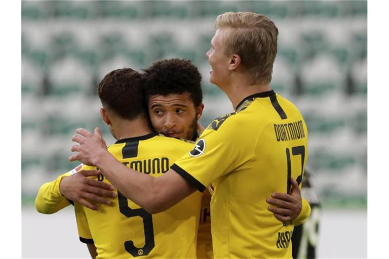 Will mit dem BVB auch gegen die Bayern Grund zum Jubel haben: Erling Haaland (r). Foto: Michael Sohn/AP-Pool/dpa