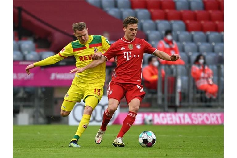 Will mit dem FC Bayern München den nächsten Sieg gegen den BVB: Joshua Kimmich (r). Foto: Sven Hoppe/dpa