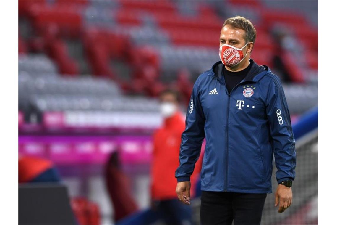 Will mit den Bayern auch in Mönchengladbach gewinnen: Münchens Trainer Hansi Flick. Foto: Christof Stache/AFP/Pool/dpa