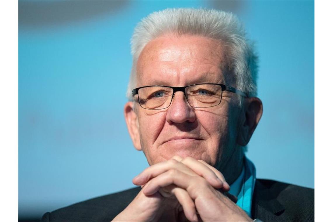 Winfried Kretschmann (Bündnis 90 / Die Grünen), Ministerpräsident des Landes Baden-Württemberg, lächelt. Foto: Guido Kirchner/dpa