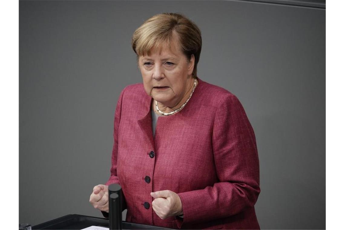 „Wir riskieren gerade alles, was wir in den letzten Monaten erreicht haben“, sagte Bundeskanzlerin Angela Merkel während der Generaldebatte zum Bundeshaushalt im Bundestag. Foto: Michael Kappeler/dpa