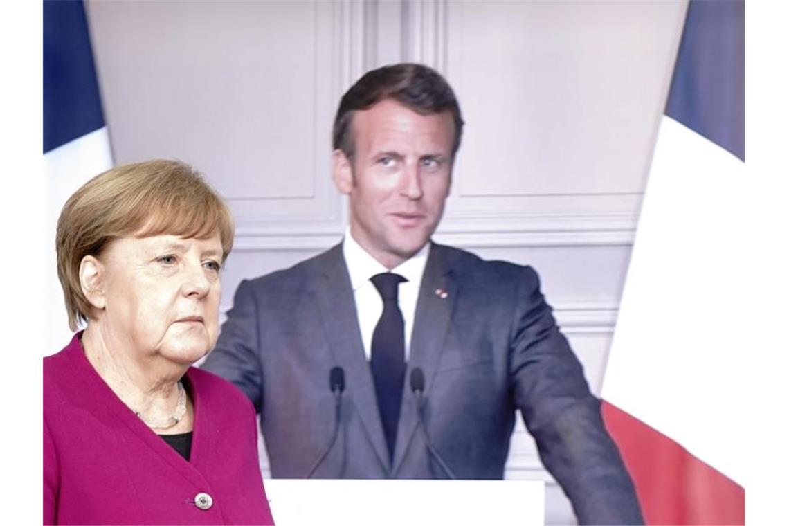 Wollen in der Pandemie-Vorsorge keine nationalen Alleingänge mehr: Bundeskanzlerin Angela Merkel (CDU) und Frankreichs Präsident Emmanuel Macron. Foto: Kay Nietfeld/dpa-Pool/dpa