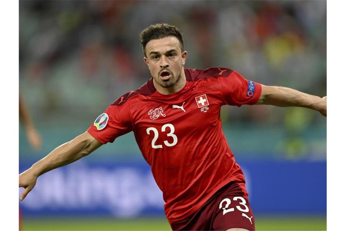 Xherdan Shaqiri aus der Schweiz bejubelt sein Tor zum 3:1 gegen die Türkei. Foto: Ozan Kose/AFP Pool/dpa